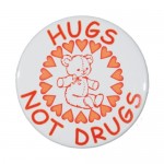1" Stock Celluloid "Hugs Not Drugs" Button with Logo